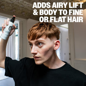 Slick Gorilla being applied to damp hair providing volume and lift