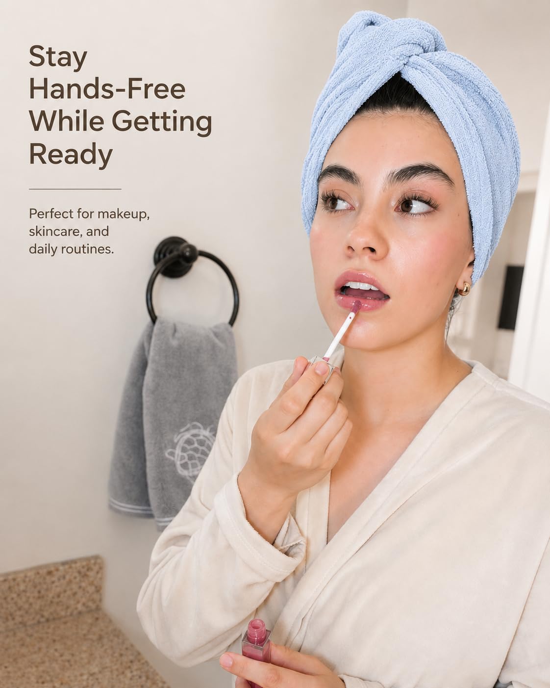 Slinkko towel wrap on hand showing lightweight travel-friendly size