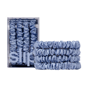 SLIP cornflower front packaging showing elegant silk scrunchies and set benefit