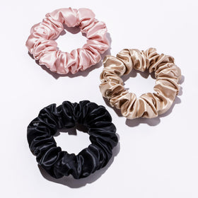 SLIP scrunchie black next to ruler size comparison benefit: large size fits long hair