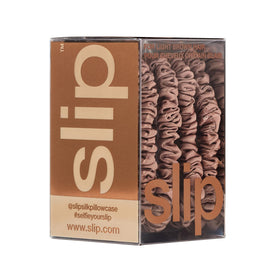 SLIP set of four light brown skinny scrunchies arranged to show coordinated gift set
