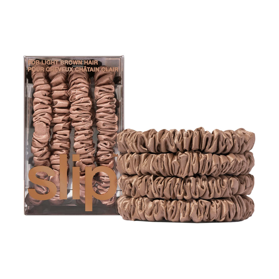 SLIP front packaging showing four light brown silk skinny scrunchies and benefits