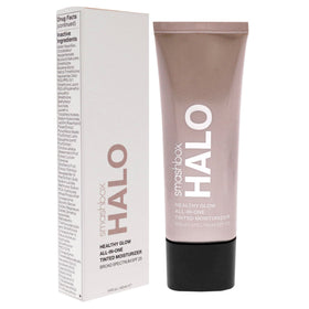 Smashbox Halo applying to skin with fingers showing natural coverage and easy application benefit