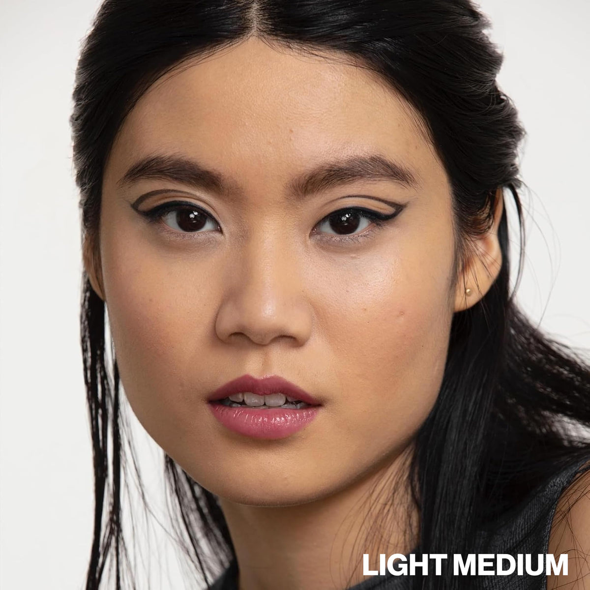 Smashbox before-and-after split showcasing complexion-evening effect