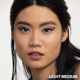 Smashbox before-and-after split showcasing complexion-evening effect