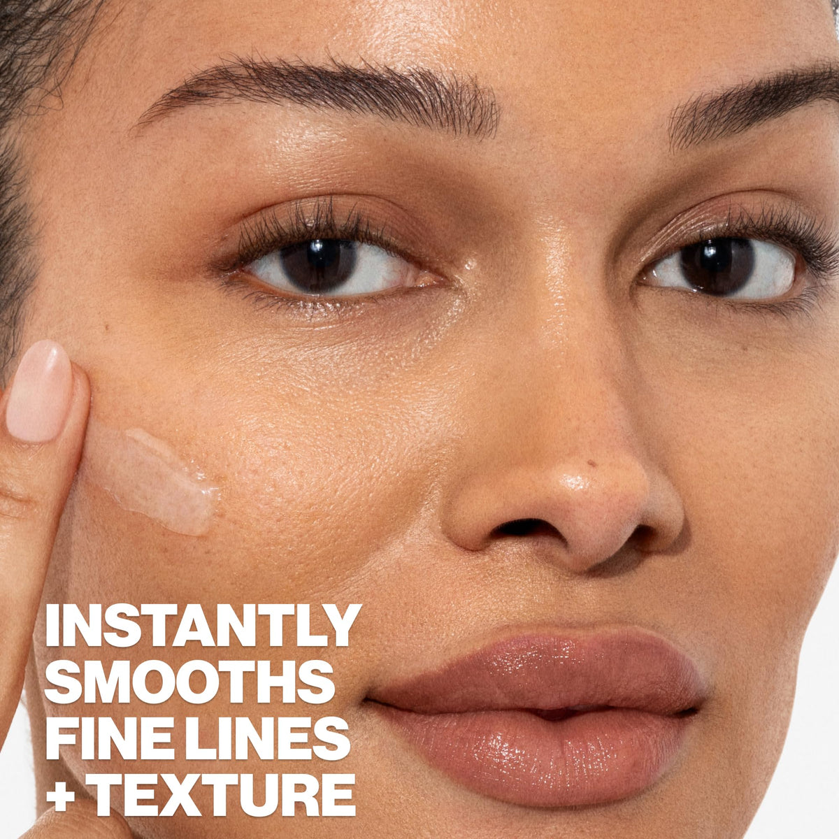 Smashbox primer applied on model face for minimized pores effect