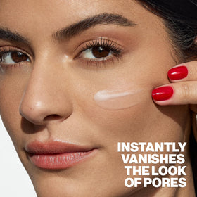 Smashbox primer on vanity with foundation showing layering and long-wear benefit