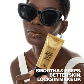 Smashbox small tube in pouch shows travel-ready SPF and makeup protection