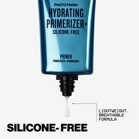 Smashbox primer on a bathroom shelf styled with towels showing everyday routine benefit