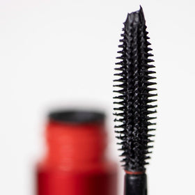 Smashbox Super Fan black formula swipe on skin showing pigment payoff and smooth texture
