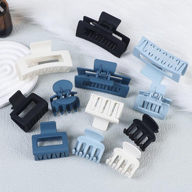 SMKSL large square clip holding long hair demonstrating strong volume hold benefit