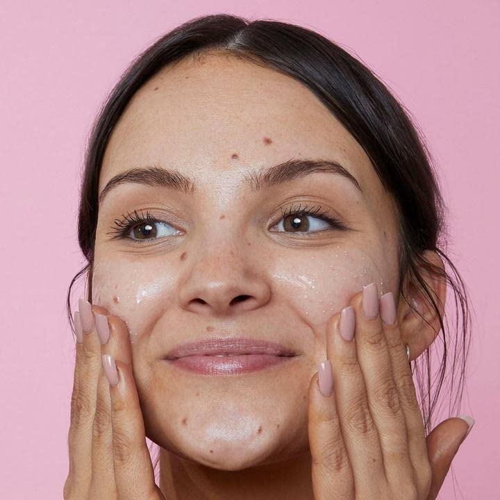 Soap & Glory dissolvable wax beads close-up showing gentle exfoliation