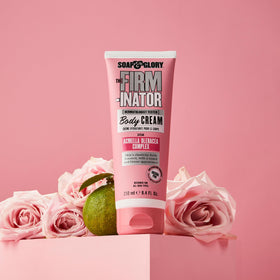 Hand applying Soap & Glory cream to arm, showing smooth absorption and skin softening