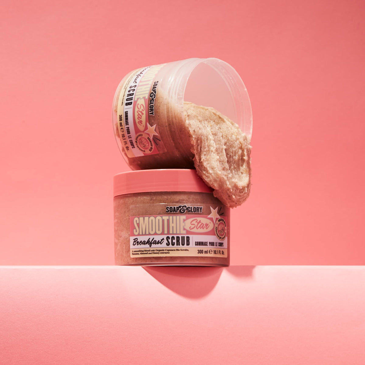 Soap & Glory scoop into hand showing creamy scrub consistency and controlled use