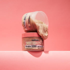 Soap & Glory scoop into hand showing creamy scrub consistency and controlled use