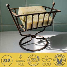 SOAP BAR in hand to show size and scale, illustrating convenient travel-friendly portion
