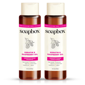 Soapbox front packaging showing duo and benefits for glossy hair