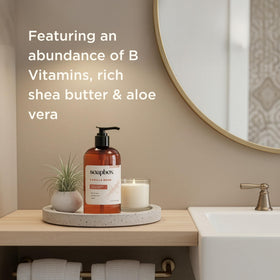 Soapbox bottle beside a hand for scale to show size and ergonomic pump