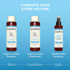 Soapbox stylist spraying model hair showing flexible hold in action