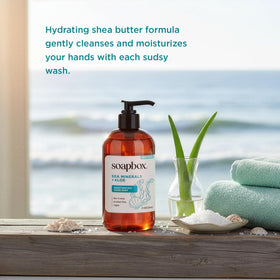 Soapbox creamy foam on hand demonstrating gentle lather and softening effect