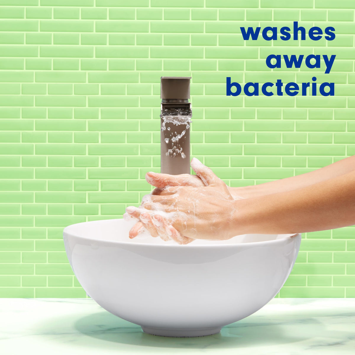 Person using Softsoap at sink for effective cleaning and hydrated hands