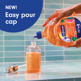 Softsoap being poured into a dispenser showing spill-free refill benefit