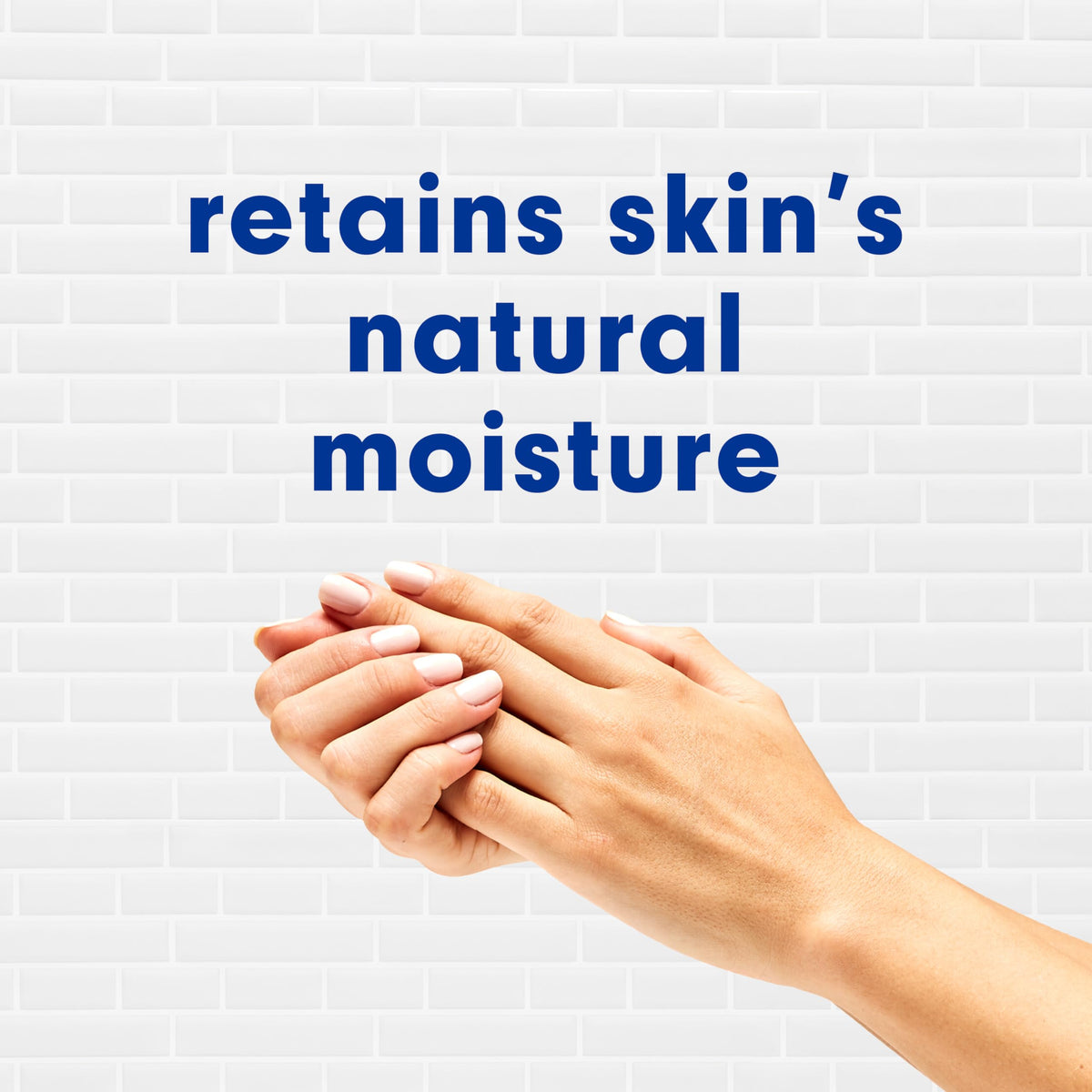 Softsoap bottle held in hand showing scale and convenient size