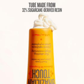 Sol de Janeiro hand cream tucked in a handbag, suggests convenient on-the-go use