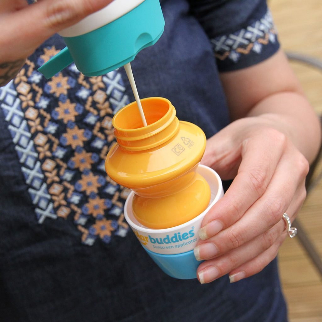 Solar Buddies close-up of sponge applicator and roller ball for even sunscreen spread
