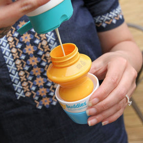 Solar Buddies close-up of sponge applicator and roller ball for even sunscreen spread