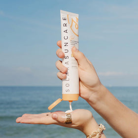 Solara Suncare label close-up featuring EWG Verified and vegan icons