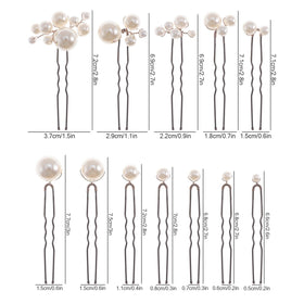 SOLENY pins placed in a bridal updo enhancing hairstyle with delicate pearls