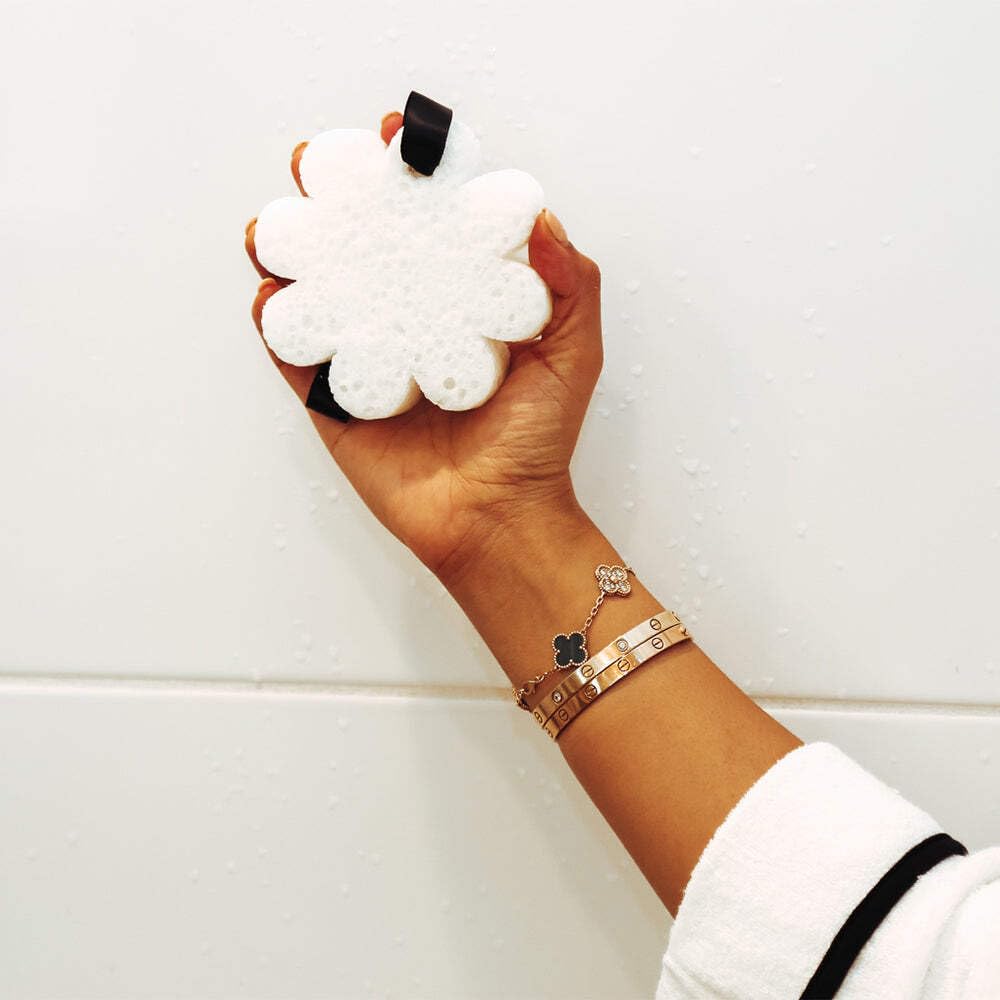 SPONGELLÉ buffer placed in bathroom lifestyle scene suggesting daily luxury and use
