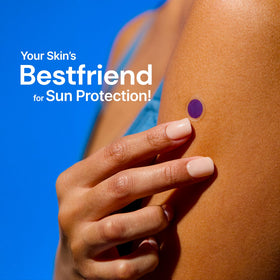 SpotMyUV sticker on a child’s shoulder demonstrating safe outdoor use