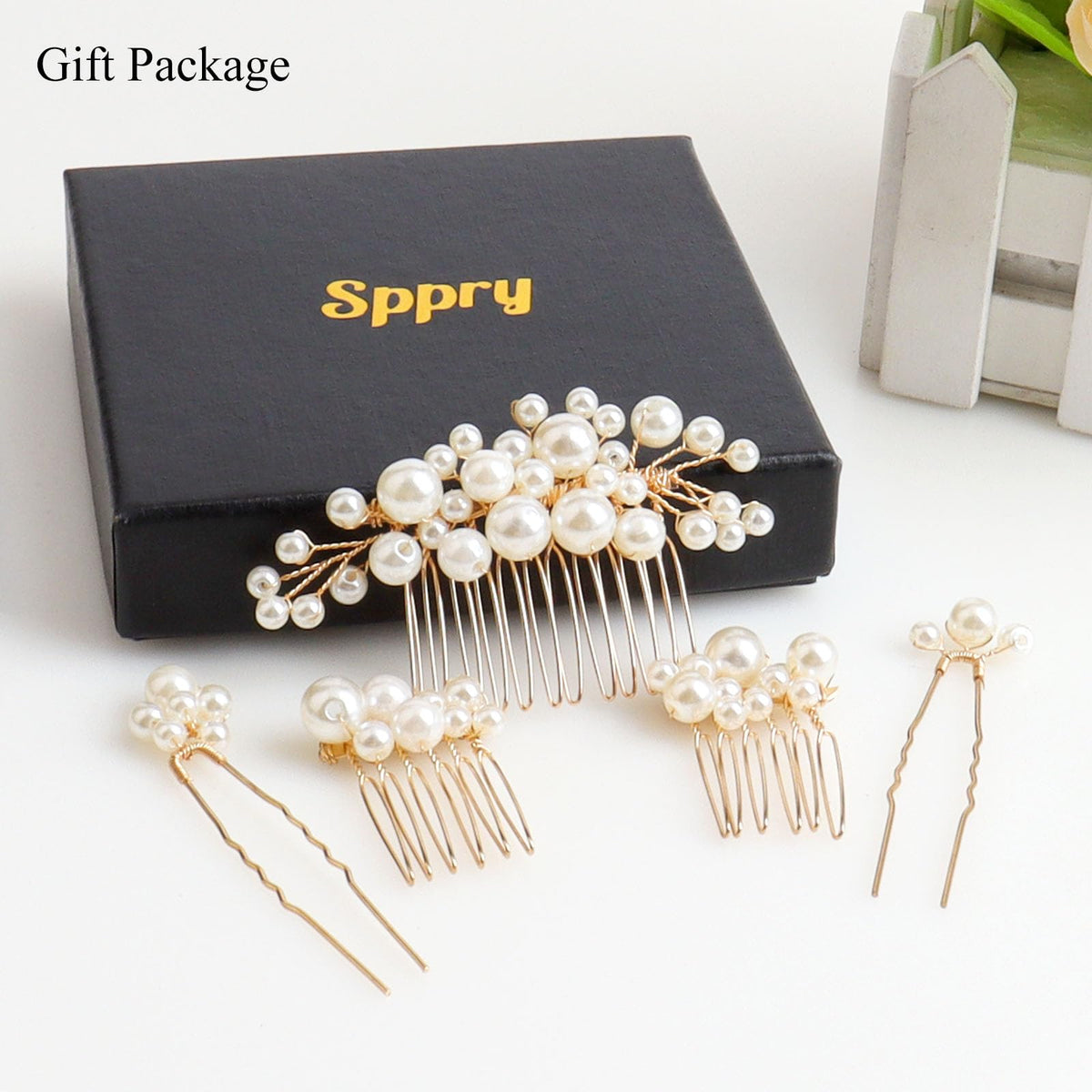 Sppry bridal hairstyle lifestyle shot adding pearl elegance to updo