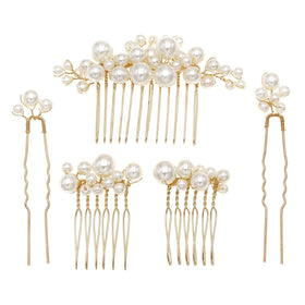 Sppry front view of gold pearl combs showing elegant detail and polish