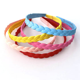 Springtime headband worn with ponytail demonstrating tidy hair control