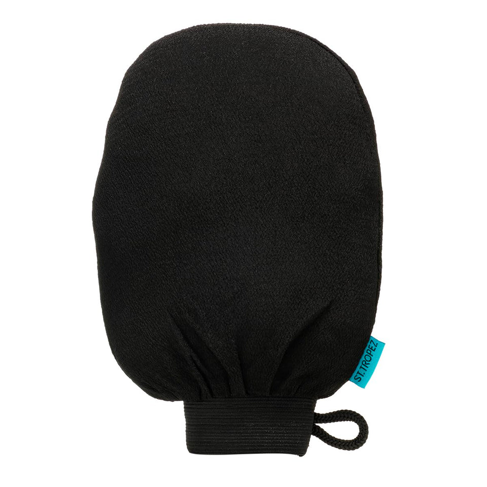 St.Tropez mitt front view showing textured exfoliating surface and ergonomic shape for smooth removal