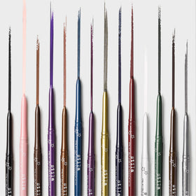 stila gel liner next to common items to show compact scale and on-the-go portability
