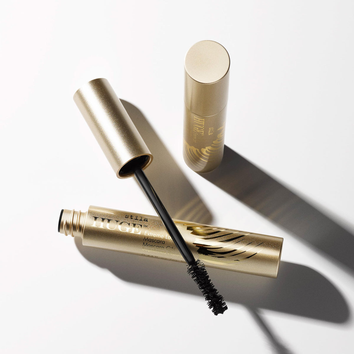 stila before and after lashes showing dramatic volume and length