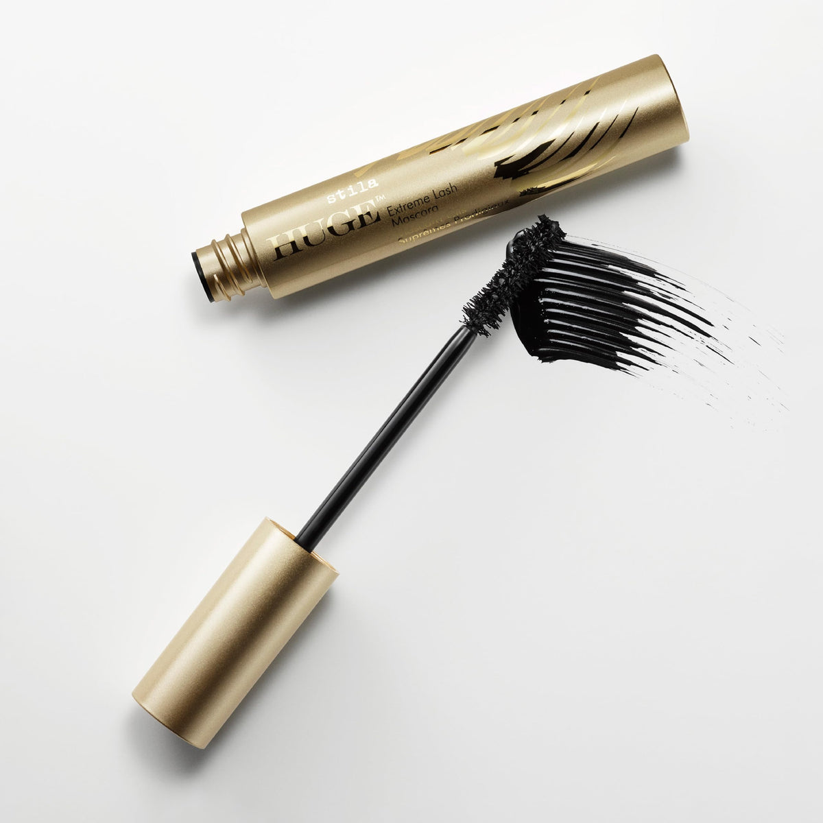 stila wand close-up highlighting curved bristles for even coating
