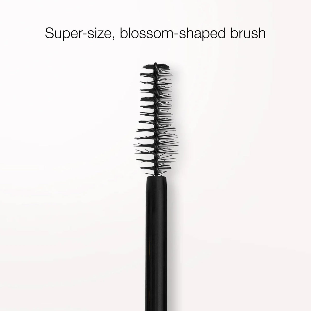 stila Magnum XXX texture swipe on skin displaying creamy formula and rich black pigment