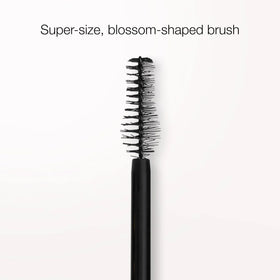 stila Magnum XXX texture swipe on skin displaying creamy formula and rich black pigment