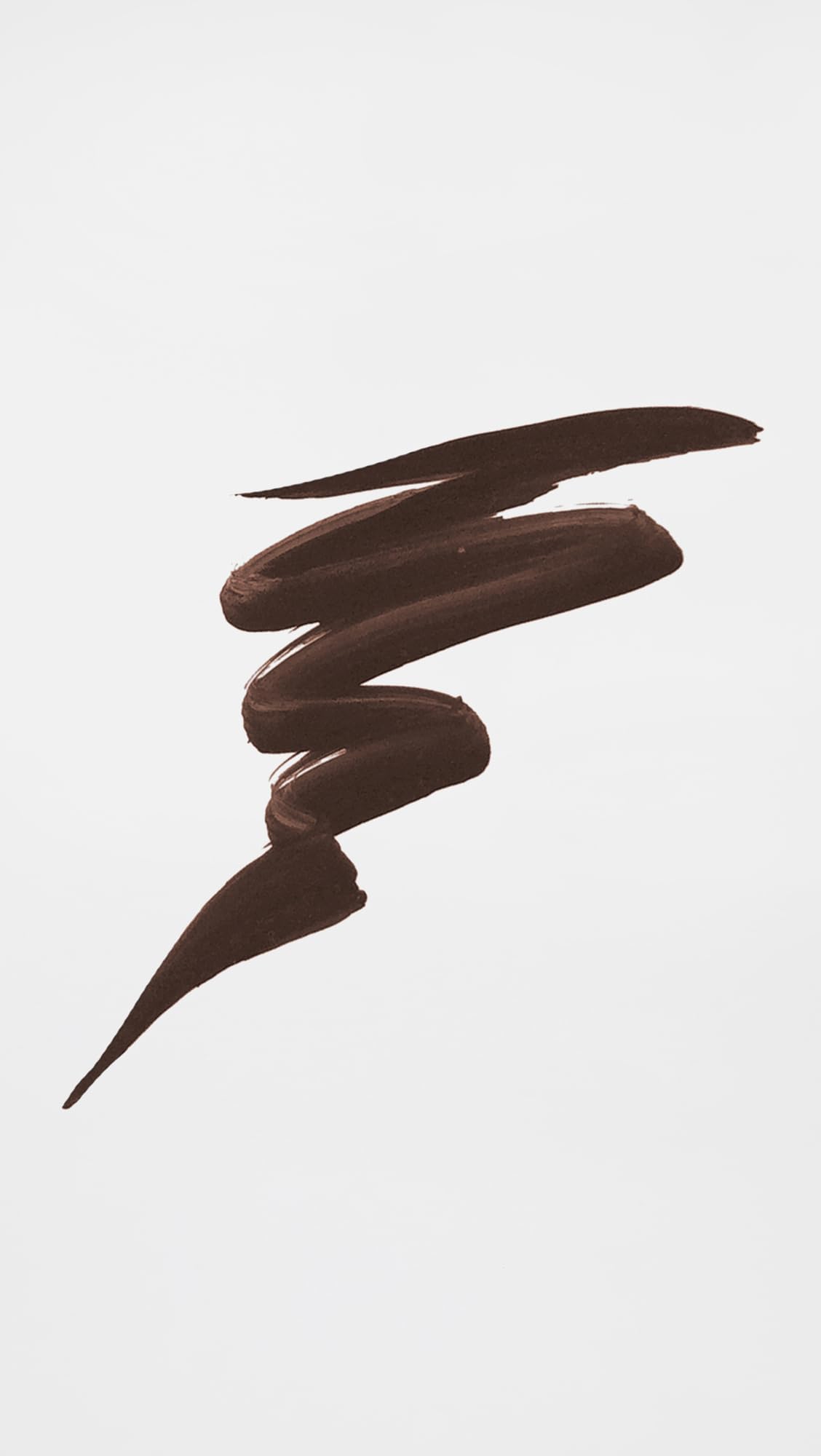 stila swatch on skin showing dark brown shade and even coverage