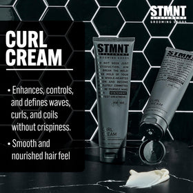 STMNT curl cream being applied to damp hair for enhanced curl definition