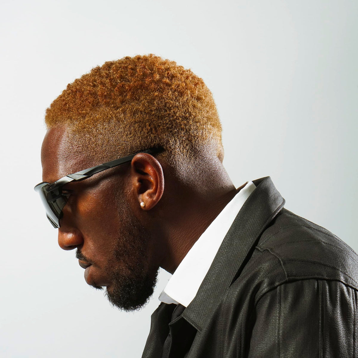 STMNT curl cream styled lifestyle shot demonstrating natural, textured finish