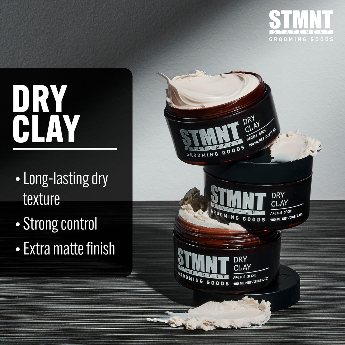 STMNT dry clay texture close-up displaying gritty clay for natural definition