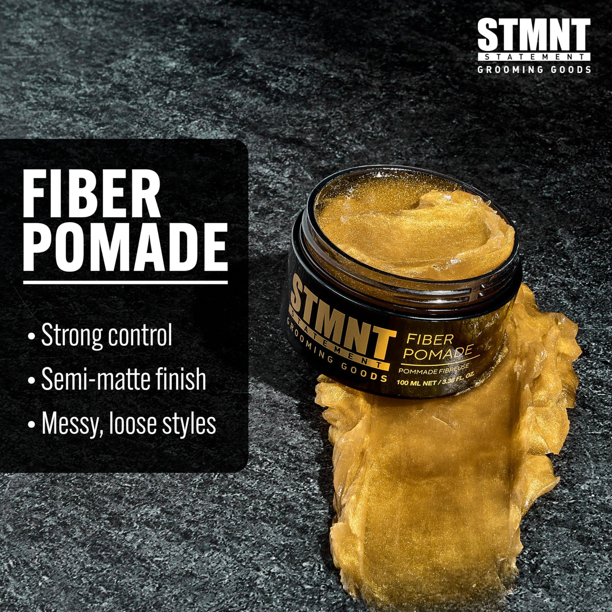 STMNT fiber pomade spread on hands demonstrating easy warming and application