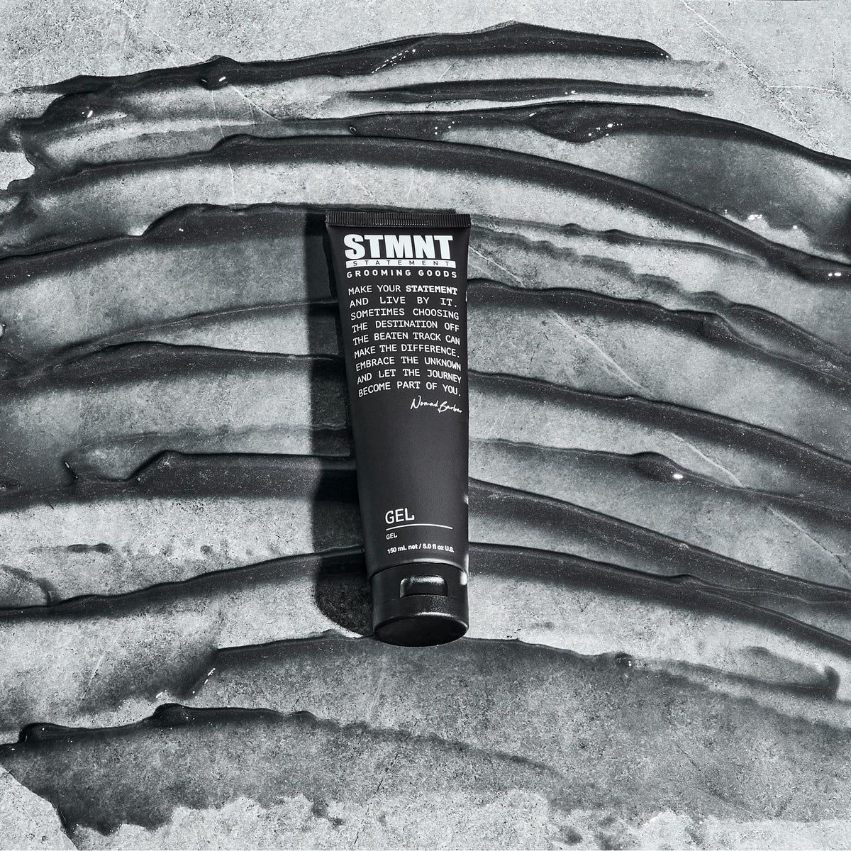 STMNT gel applied in hair showing firm definition and natural movement