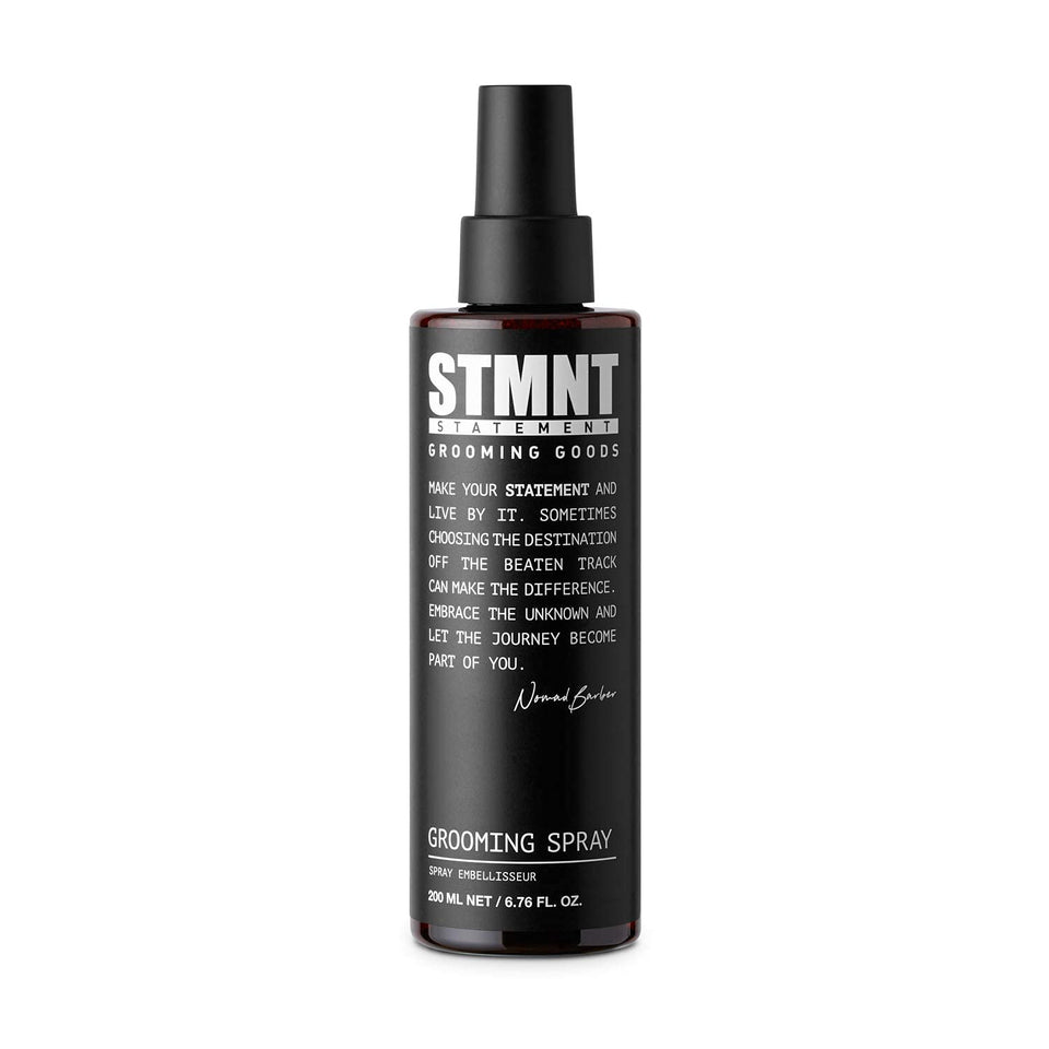 STMNT grooming spray front bottle shows label and sleek design for easy storage